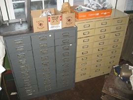 2 multiple drawer cabinets filled with hardware.  