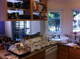 Kitchen with dishes and baking pans, many new