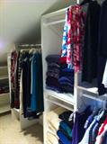 attic room with more designer clothing