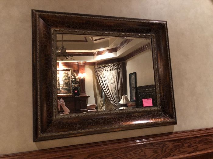 Very large framed beveled mirror