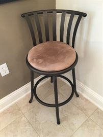 Three tall barstools, one shorter stool, same design