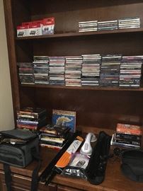 Music CDs, movie DVDs, tabletop easels, Canon camera w/bag