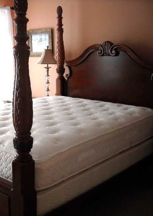 Queen four poster bed with 2 matching side chests.