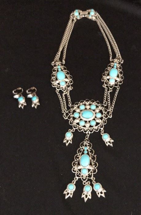 Jewerly including turquoise.
