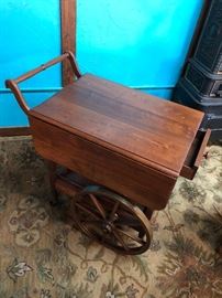 Incredible hand made teak tea cart. This piece was made by Master Wood Carver, Robert Shelton of Bremerton, Washington.  It is signed on the bottom as well as having the original purchasers name. I would venture to say you have never seen a tea cart as well made and beautiful as this one.