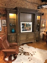 Incredible Habersham flat screen entertainment center. This piece costs over $25,000.00 new and this one is in like new condition. Needless to say this piece is priced at a fraction of the original price. Just think what the Jones will say when they find out you have a $25,000.00 dollar TV cabinet in your family room ;-) I encourage you to look up Habersham furniture to see the pricing for yourself.