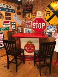 Cool Corona bar made from an old Corona sign as well as tons of vintage signs and neon lights.