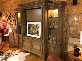 Incredible Habersham flat screen entertainment center. This piece costs over $25,000.00 new and this one is in like new condition. Needless to say this piece is priced at a fraction of the original price. Just think what the Jones will say when they find out you have a $25,000.00 dollar TV cabinet in your family room ;-) I encourage you to look up Habersham furniture to see the pricing for yourself.