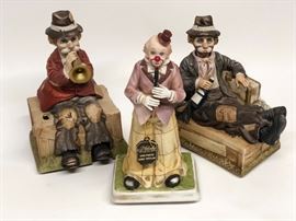 Mechanical porcelain clowns that play a tune.  