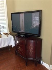 Flat Screen TV and Painted Wood Cabinet.