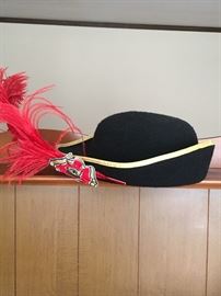 Ladies' hat with a red feather