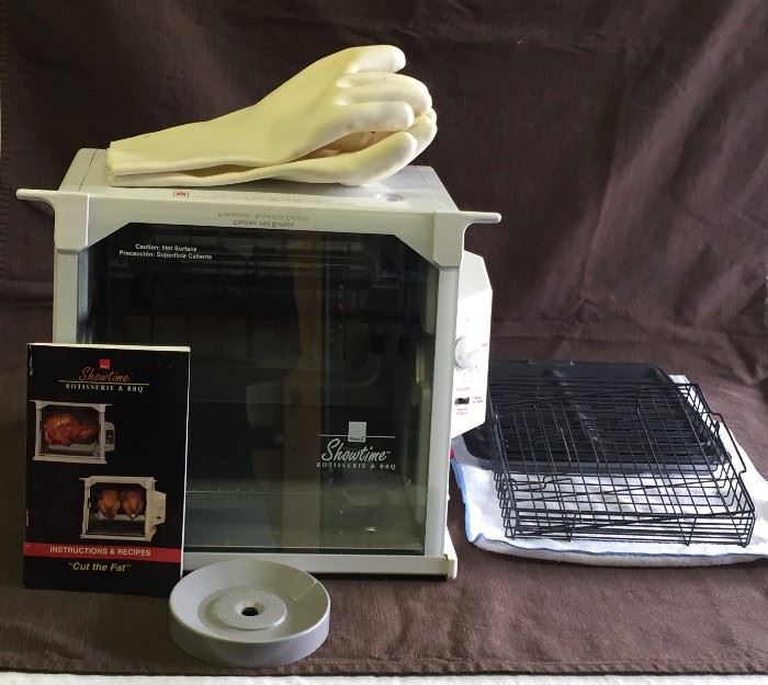 Like New: Showtime Digital Rotisserie and BBQ Oven complete with racks, heat resistant gloves, instruction manual with recipes. Cook two full size chickens  side-by-side, up to a 15 lb. turkey.