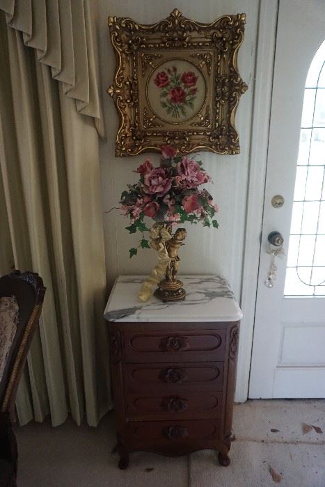 Artwork with Ornate frame, marble topped side table