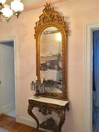 American, mid-19th Century Pier glass with matching console, ca. 1850.  Original gilt and gold leaf finish.  Original mercury back mirror.