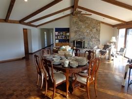 Cherry Dinning Table and 6 chairs. Stately Outfit By American Craftsman Collection. Stanley Furniture Co. #0511-33 WoodTone C-7-9-S. The Table measures 30" H x 68"L x 44"W and has two 16" leafs that total a length or 104" Included are 6 padded seat chairs with a fabric that can be wiped off.
