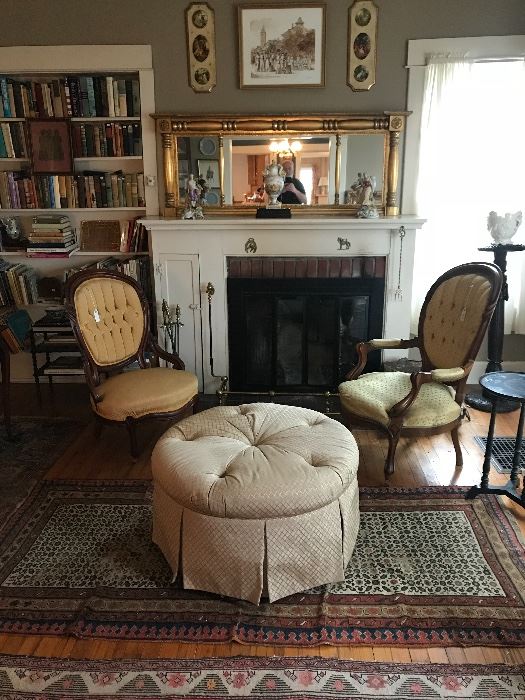 Victorian Living Room at the farm house, his and her side chairs and a round ottoman, great rugs and above the fireplace an Empire mirror circa 1860