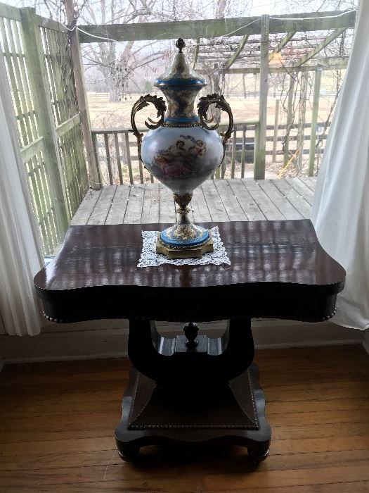 An Emerican Empire game table circa and the best example of a Severs vase circa 