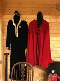 Black Velevet hooded coat along with a red wool cap with a Russian lamb cap