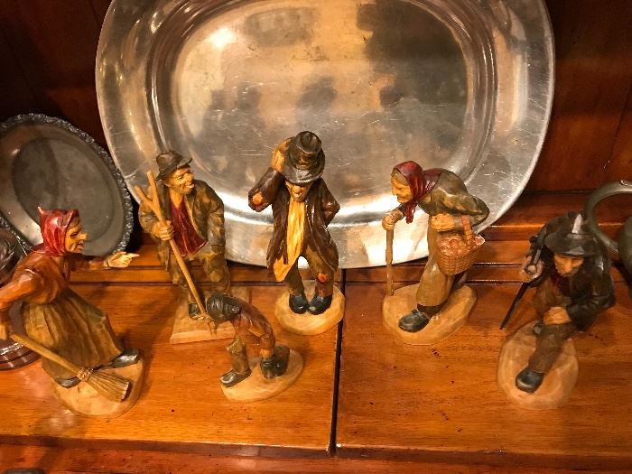 A collection of hand carved wooden figures from Germany 