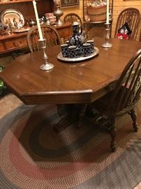 An Ethan Allen Royal Charter table, shown here with one of its two leaves