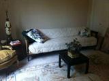 Antique sofa, lamp and chair.  Tables.