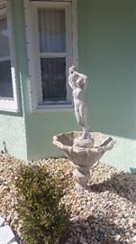 Roman Lady Concrete Fountain. There is a crack around her lower leg that needs repair 50"