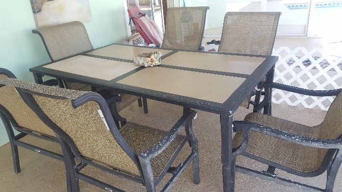 Patio Set with Rocker Chairs. Tile Insets. Metal/Aluminum needs some TLC but set is in good condition otherwise