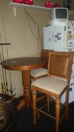 Wood Pedestal Hi-Top Table with 4 Chairs (only 2 are shown in the picture.