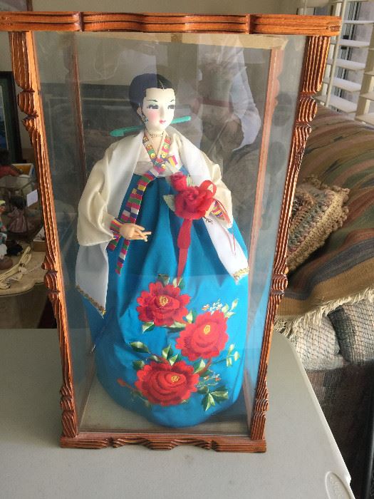 Glass encased Japanese doll