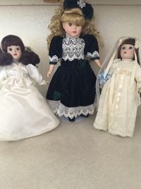 Collection of dolls,  doll on the right is Annie, Bride of the gay nineties (Danbury Mint)