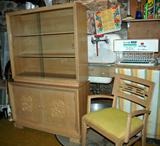 Dining room china cabinet and chair with original color seat.