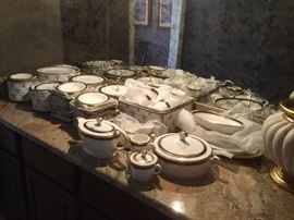 Service for 15 Noritake Gold and Sable fine china.