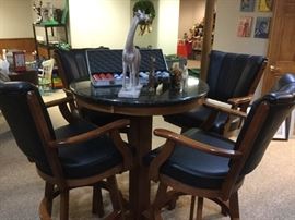 Pub table with 4 armchairs.