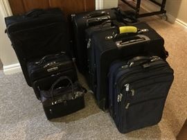 Tumi and Brighton luggage.