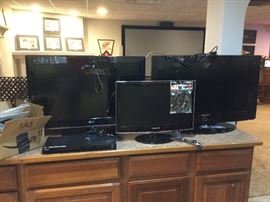3 LG flat screen televisions.