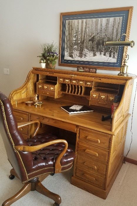 Beautiful Oak Roll top Desk with a great tufted leather chair.....think of the great business you could do!