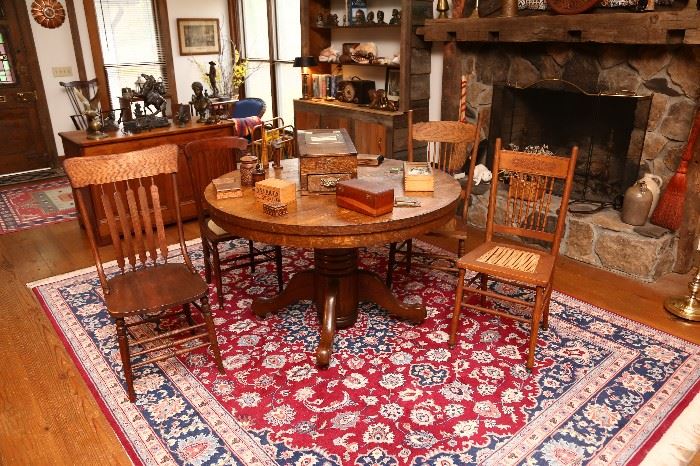 Round oak table, assorted chairs, collection of wooden b oxes.