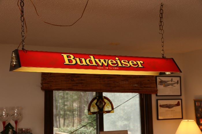 Hanging Budweiser sign.