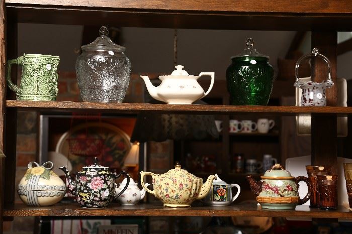 Many teapots and other kitchen items.