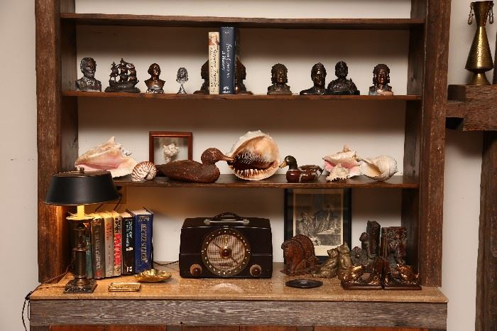 Large seashells, books, vintage radio, bronze, brass small busts of famous people.