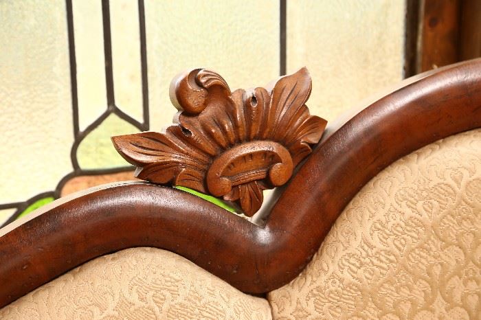 Detail of carving on Empire sofa.
