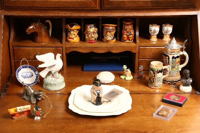 Royal Doulton small toby jugs and Winston Churchill collectibles.