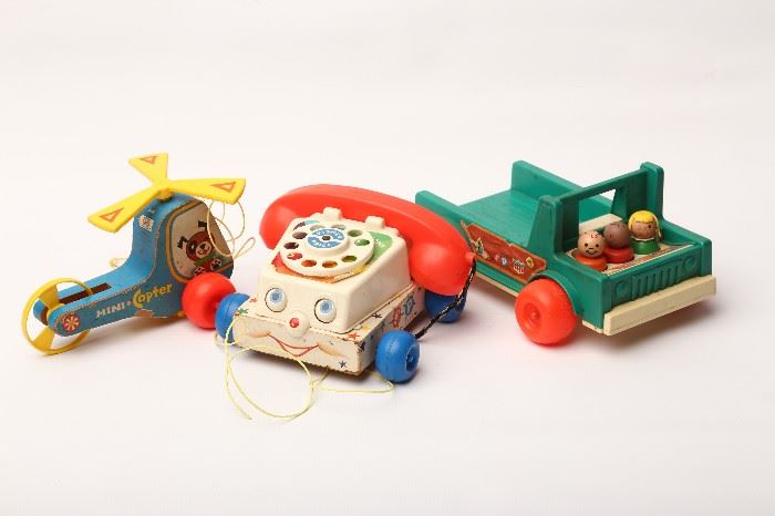 A few of many Fisher-Price toys, mid century.