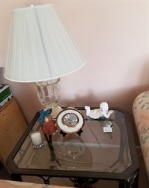 Glass top side table, lamp and figurines
