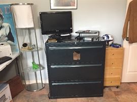 Very nice metal folding cabinet, TV, rolling drawers, lamp
