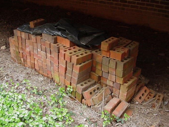 Huge pile of bricks ready to build a walkway or patio