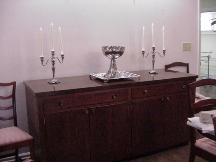 Another buffet with double drawers above and drawers below.  