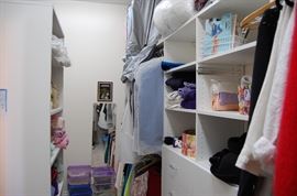 walk in closet full od suits, clothes and very nice outfits