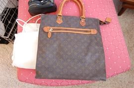 Louis Vuitton near check out and jewelry