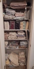 Sheet sets, some still new in the packages. Not shown are several comforter sets.